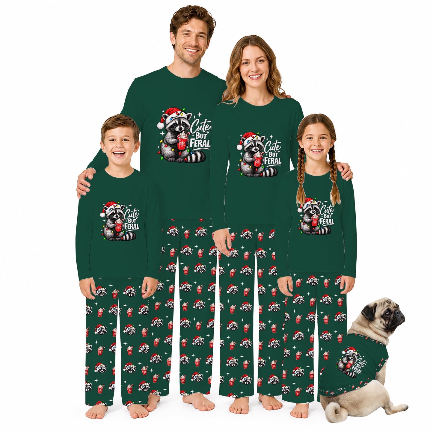 A family of four wearing matching dark green long-sleeve pajamas with a raccoon graphic and 'Cute Feral' text, standing barefoot against a white background, with a small dog sitting beside them in matching pajamas.