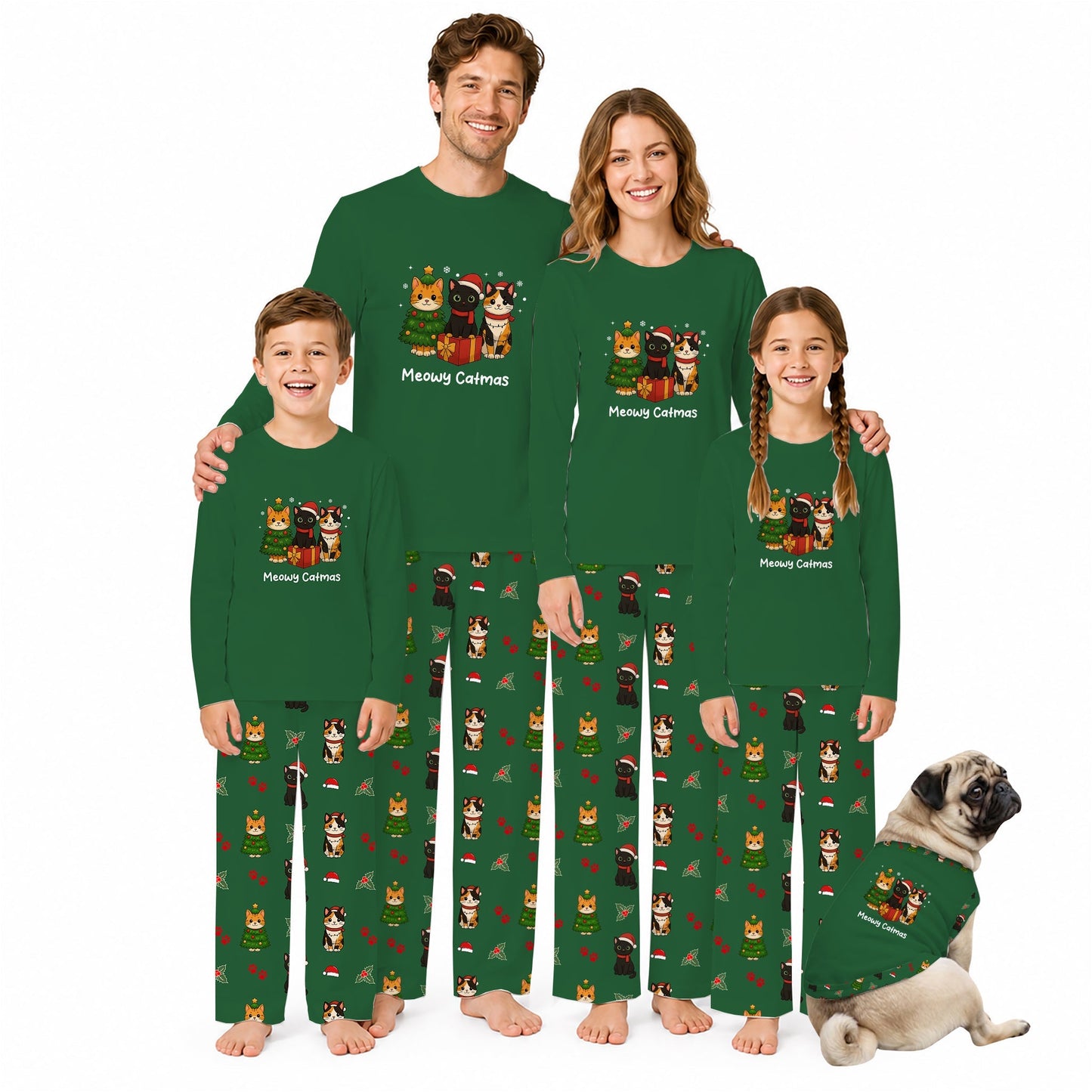 A family of four wearing matching dark Green long-sleeve pajamas with Christmas cat illustrations and text, standing barefoot against a White background, with a pug dog wearing a matching pajama shirt at the lower right.