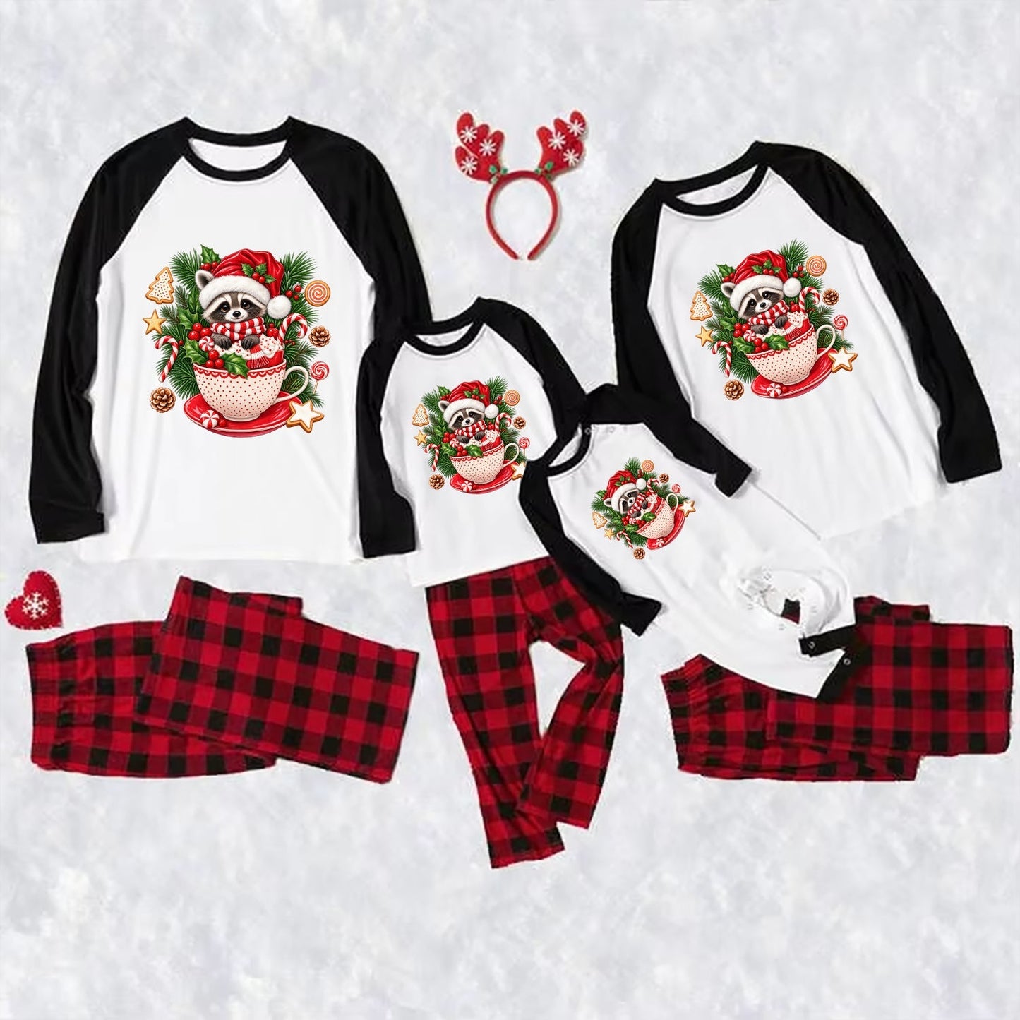 A coordinated Christmas pajama set shown on a white background, including long-sleeve raglan tops and matching plaid pants in red and black buffalo plaid, each top featuring a festive Raccoon-themed graphic.